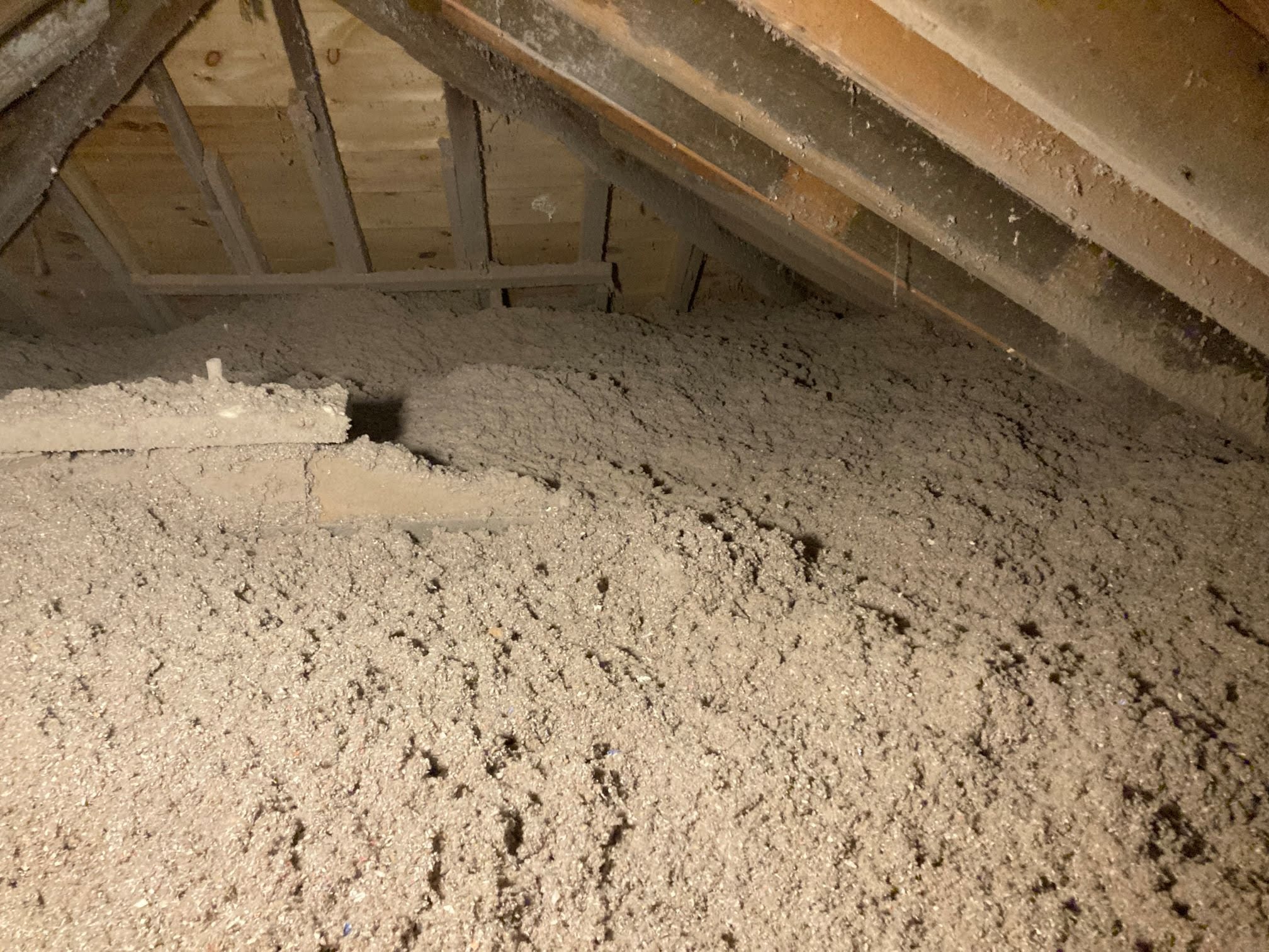 attic with blown celulose insulation