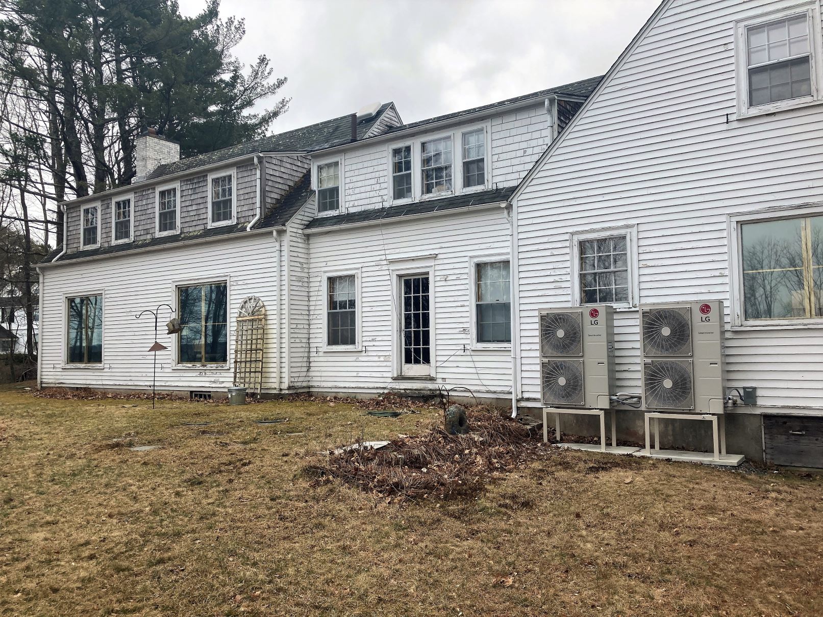 building with two outside compressors for the ducked air source heat pump